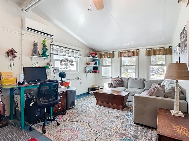 a living room with furniture and a couch