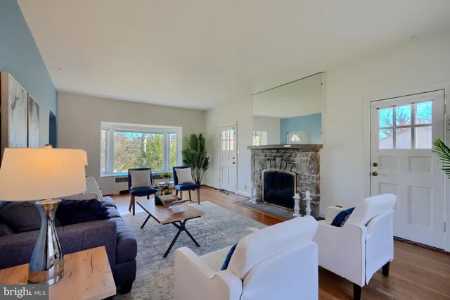 a kitchen with cabinets appliances a sink and a counter top