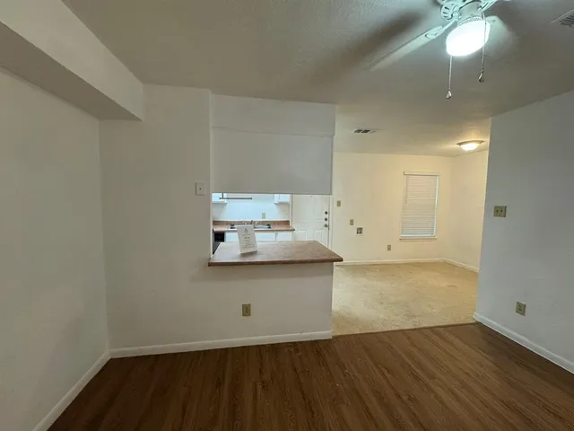 a kitchen that has a sink and a stove