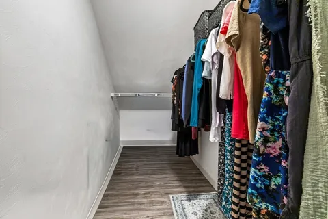 a view of a walk in closet