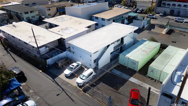 an aerial view of a house with outdoor space