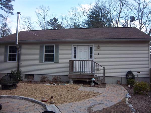 4 Circle Street Middleton, MA 01949 - Photo 1 of 19 a backyard of a house with seating space