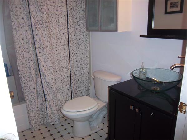 4 Circle Street Middleton, MA 01949 - Photo 14 of 19 a bathroom with a granite countertop toilet and a sink