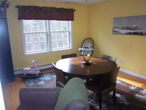 4 Circle Street Middleton, MA 01949 - Photo 7 of 19 a view of a dining room with a table and chairs