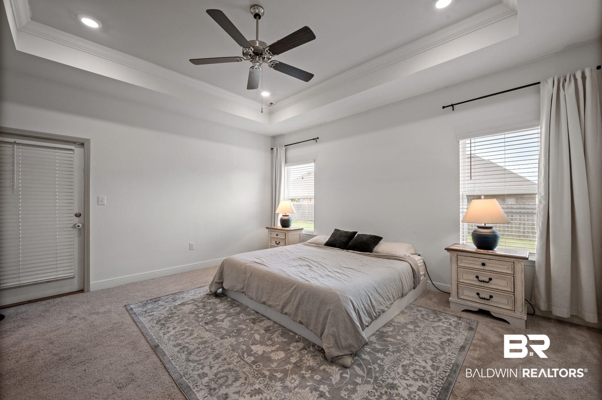 10169 Dunleith Loop Daphne, AL 36526 - Photo 31 of 40 Bedroom with carpet, ornamental molding, a raised ceiling, recessed lighting, and ceiling fan