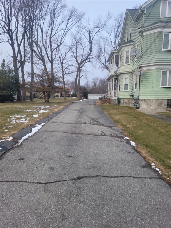 300 Read Street Somerset, MA 02726 - Photo 7 of 9 a view of road with large trees