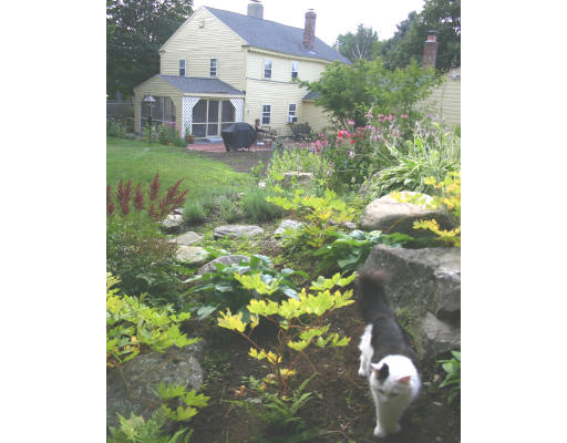 208 Great Road Stow, MA 01775 - Photo 8 of 9 a view of a house with a yard