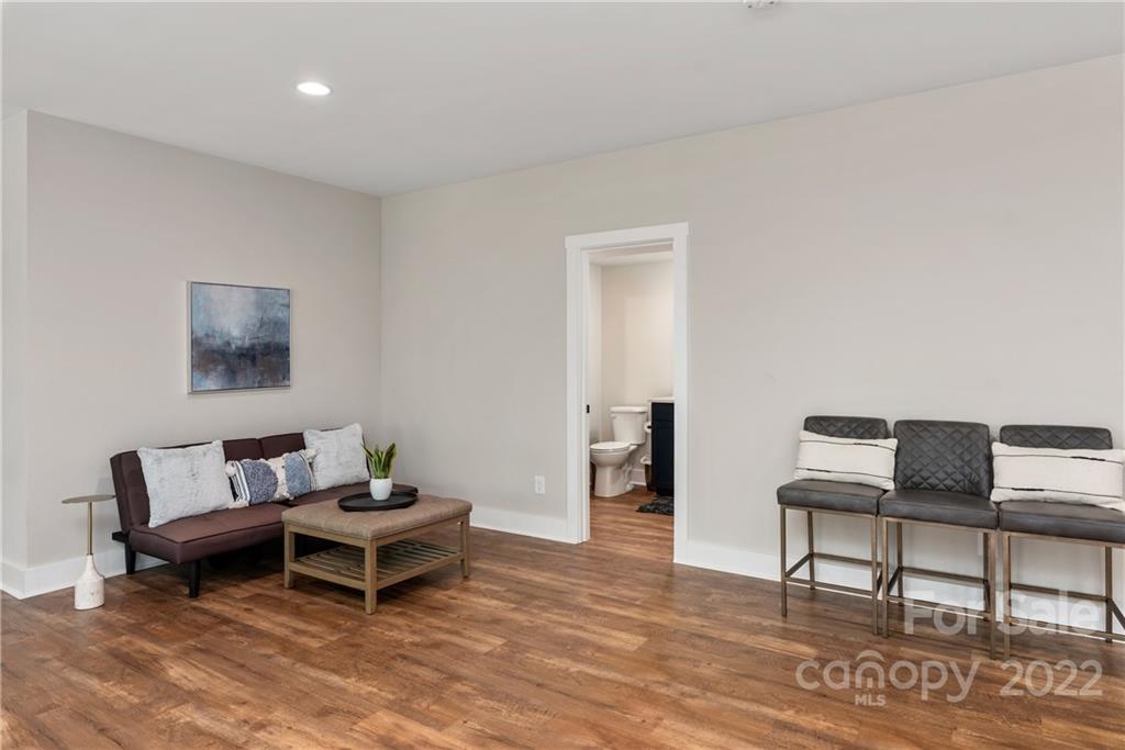 513 Small Batch Path Fort Mill, SC 29708 - Photo 39 of 48 a living room with furniture and a rug