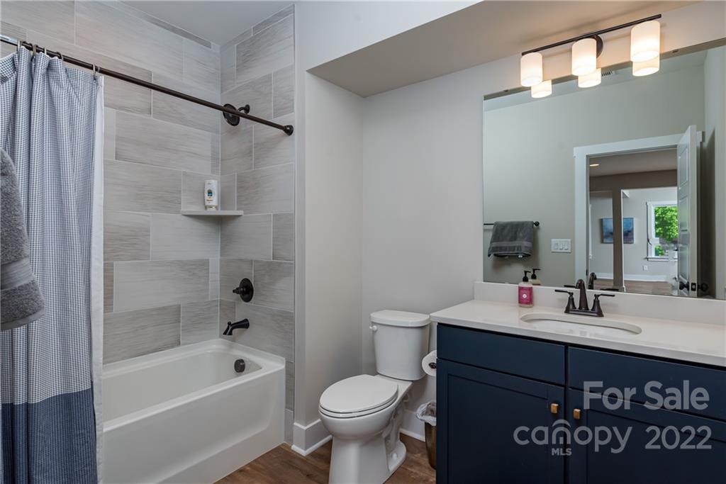 513 Small Batch Path Fort Mill, SC 29708 - Photo 40 of 48 a bathroom with a sink toilet and shower