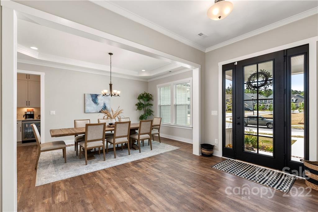513 Small Batch Path Fort Mill, SC 29708 - Photo 4 of 48 a view of a dining room with furniture window and wooden floor