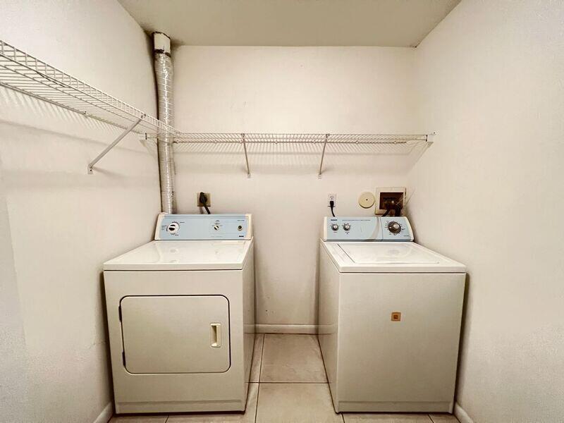 10225 Northwest 33rd Street Sunrise, FL 33351 - Photo 14 of 51 a utility room with dryer and washer
