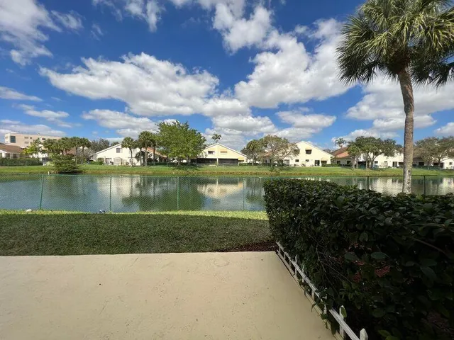 a view of a lake with a city