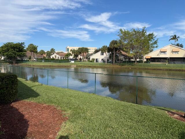 10225 Northwest 33rd Street Sunrise, FL 33351 - Photo 39 of 51 a view of a lake with houses