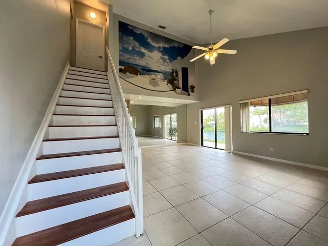 a view of entryway and hall with a window