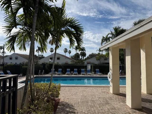 a front view of a house with swimming pool