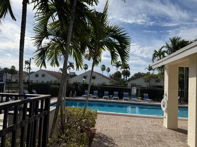 a view of a house with swimming pool