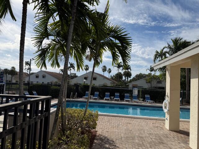 10225 Northwest 33rd Street Sunrise, FL 33351 - Photo 45 of 51 a front view of a house with swimming pool