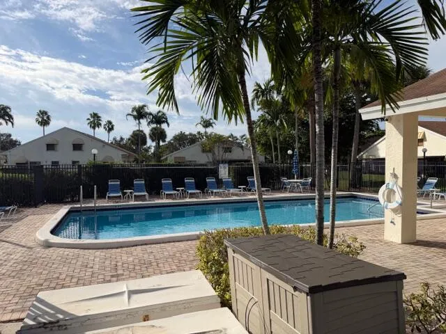 a view of a house with a swimming pool