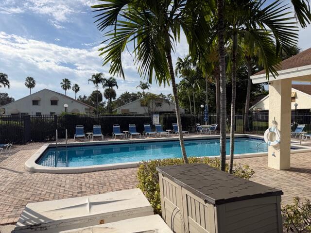 10225 Northwest 33rd Street Sunrise, FL 33351 - Photo 46 of 51 a view of a house with swimming pool
