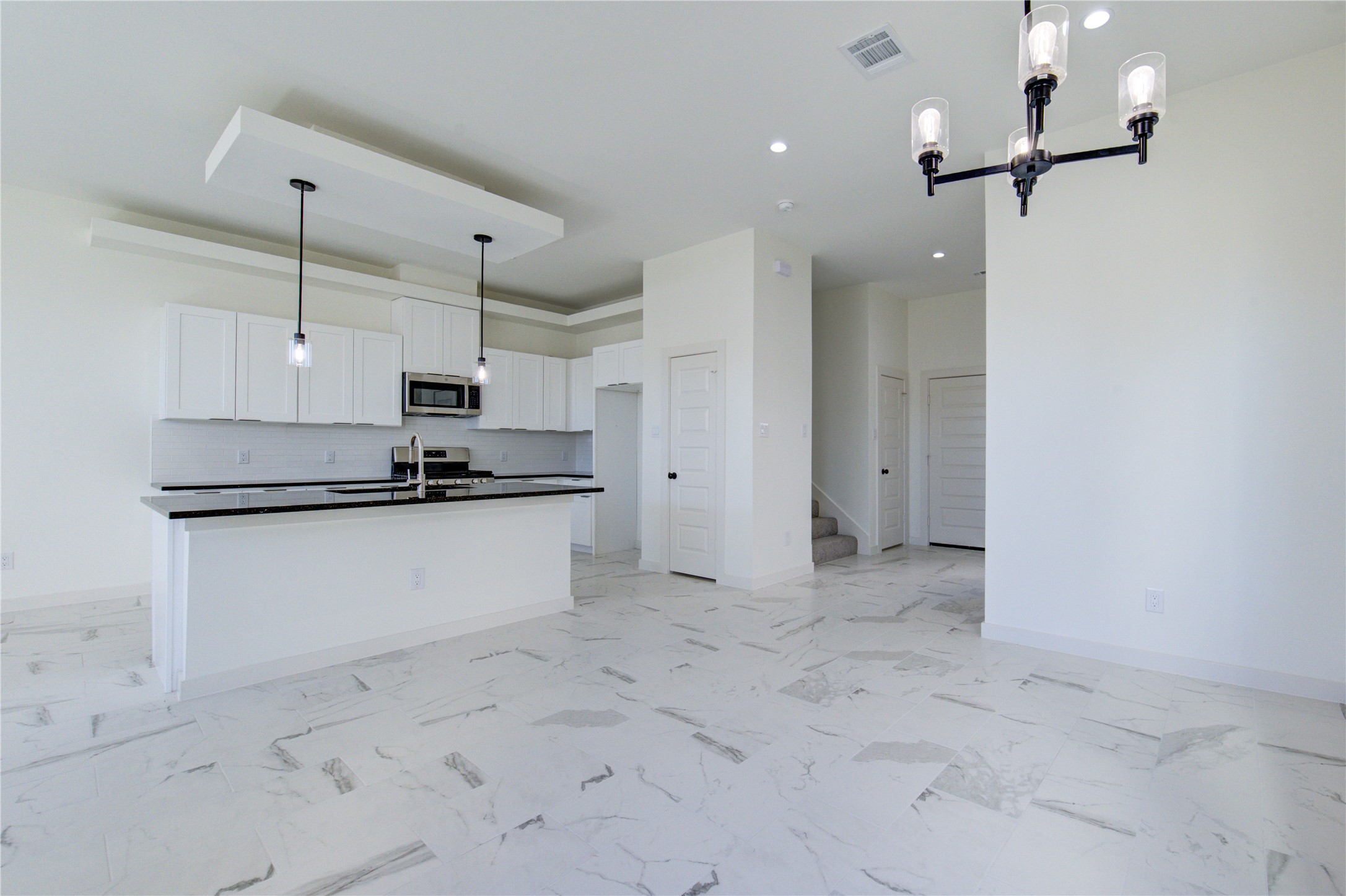 2931 El Fenice Lane Houston, TX 77057 - Photo 15 of 46 a view of kitchen refrigerator and microwave