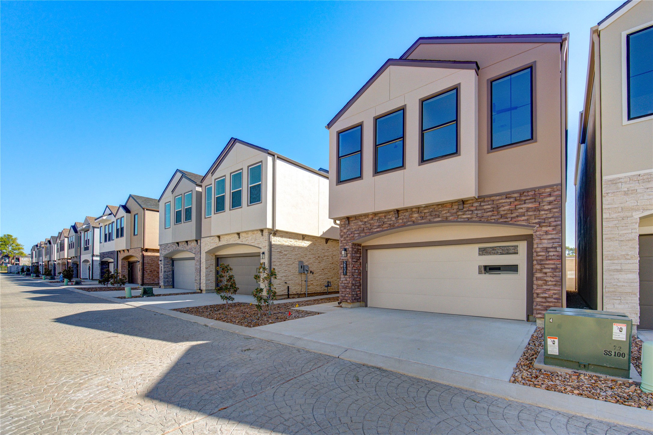 2931 El Fenice Lane Houston, TX 77057 - Photo 2 of 46 a view of a white building among the street