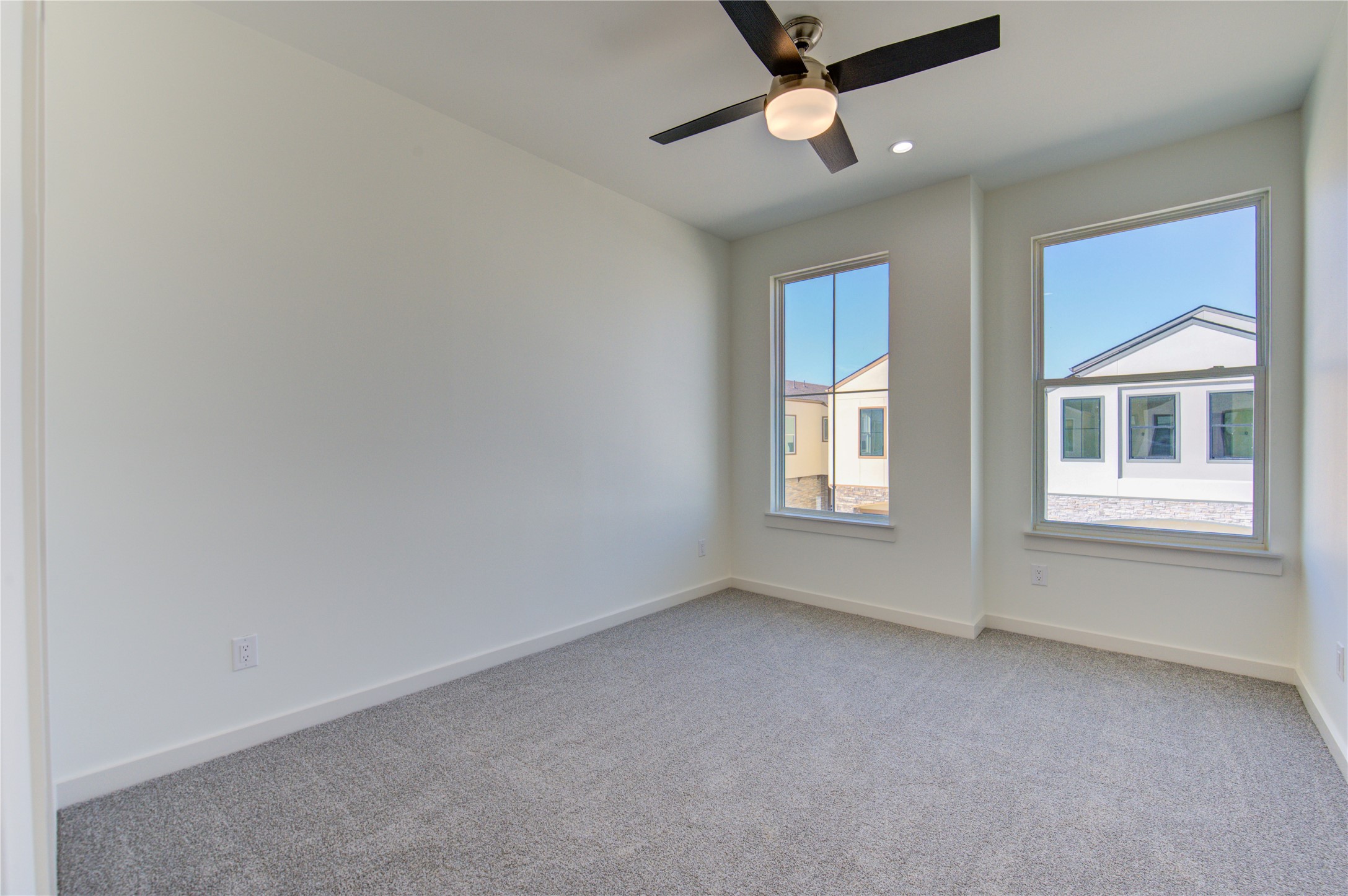 2931 El Fenice Lane Houston, TX 77057 - Photo 22 of 46 an empty room with a window and ceiling fan