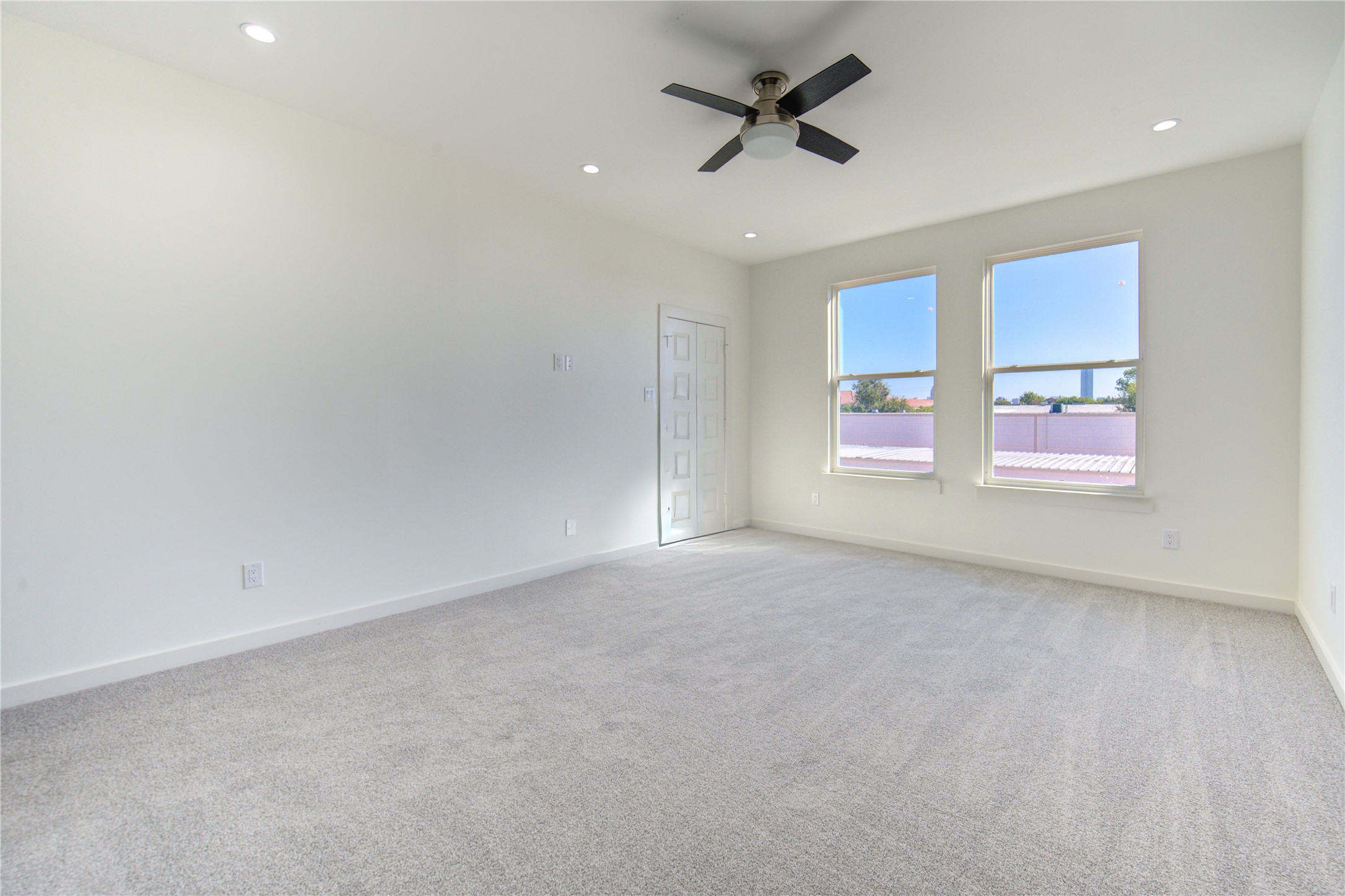 2931 El Fenice Lane Houston, TX 77057 - Photo 25 of 46 an empty room with a empty space and a ceiling fan