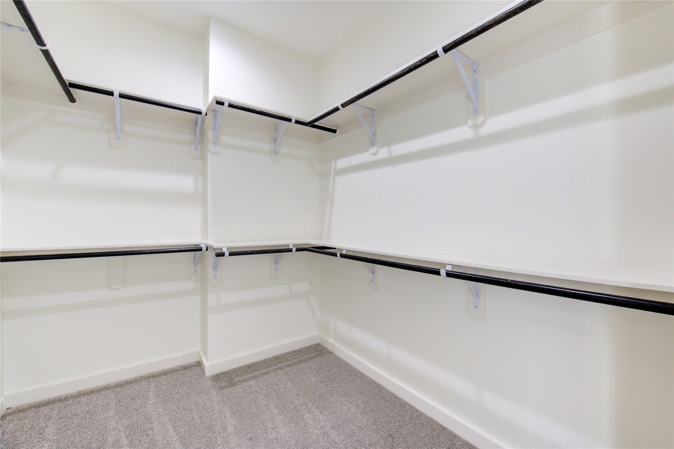 2931 El Fenice Lane Houston, TX 77057 - Photo 28 of 46 a view of a room with racks on the wall