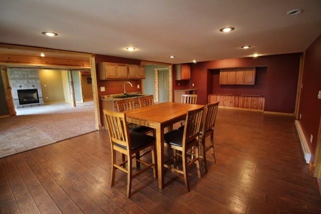 742 North River Road Ridott, IL 61067 - Photo 17 of 25 a dining room with furniture and wooden floor