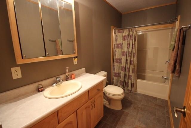742 North River Road Ridott, IL 61067 - Photo 19 of 25 a bathroom with a sink toilet and shower