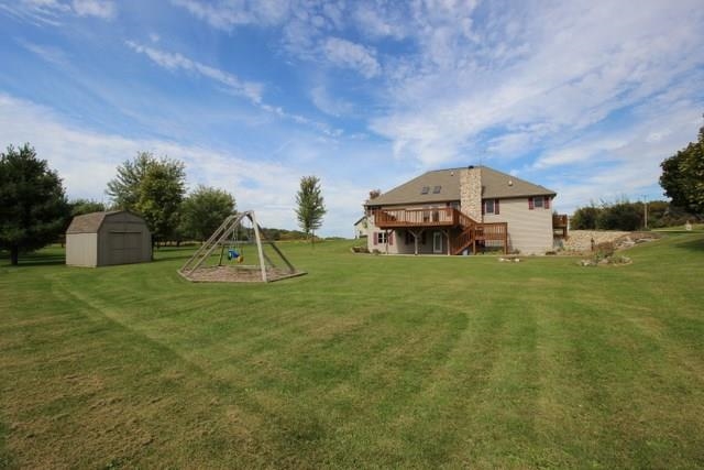 742 North River Road Ridott, IL 61067 - Photo 25 of 25 a house view with a garden space