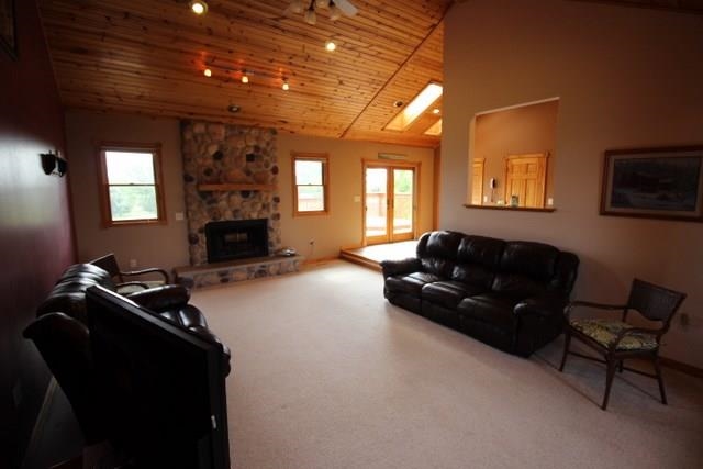 742 North River Road Ridott, IL 61067 - Photo 3 of 25 a living room with furniture windows and a fireplace