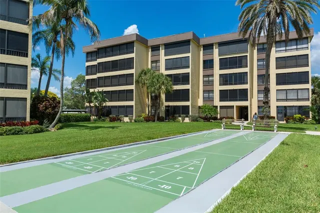 a front view of a building and a yard