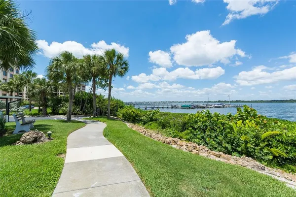 a view of a lake with a big yard