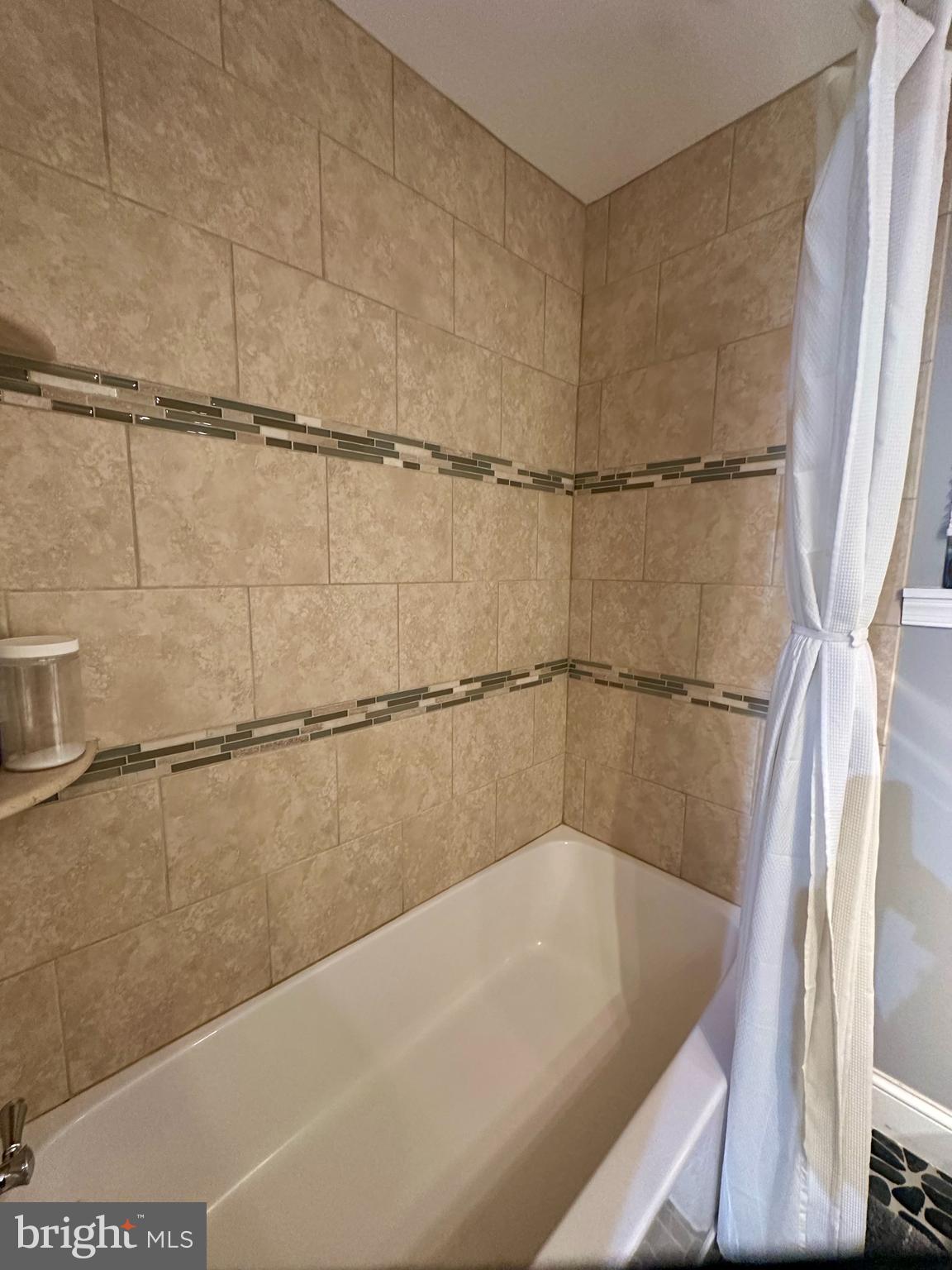 61 Greenhill Road Media, PA 19063 - Photo 24 of 37 a bathroom with a shower and a shower