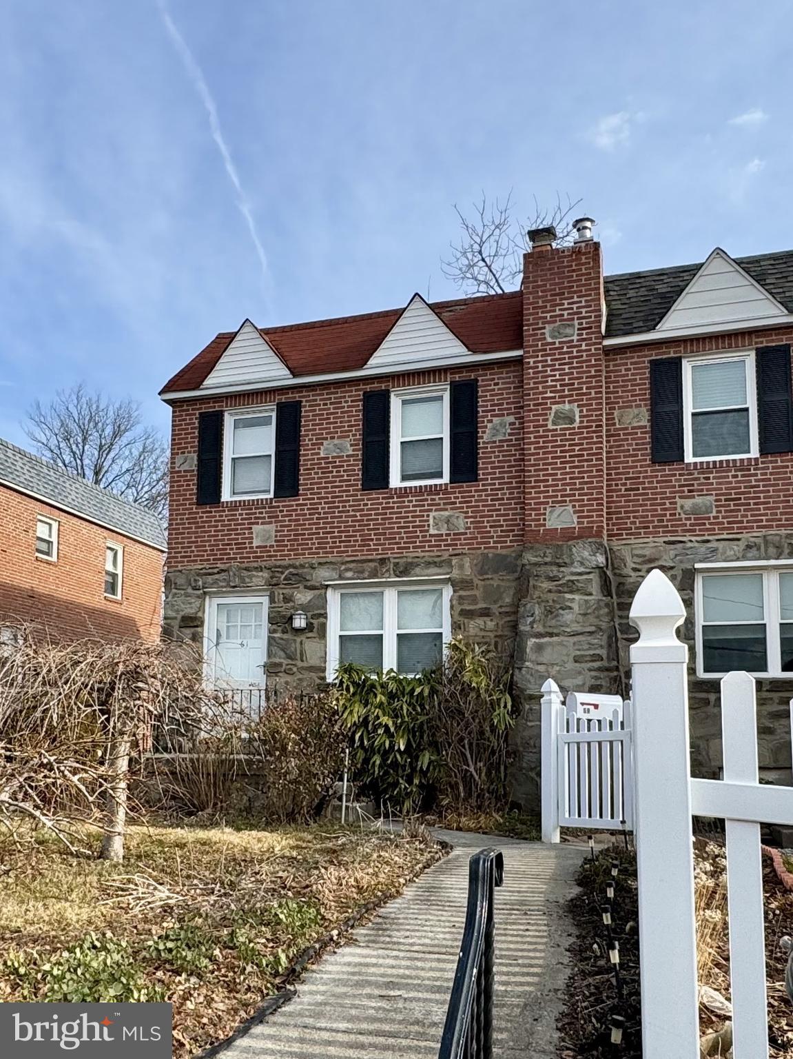 61 Greenhill Road Media, PA 19063 - Photo 34 of 37 a front view of a house with a yard