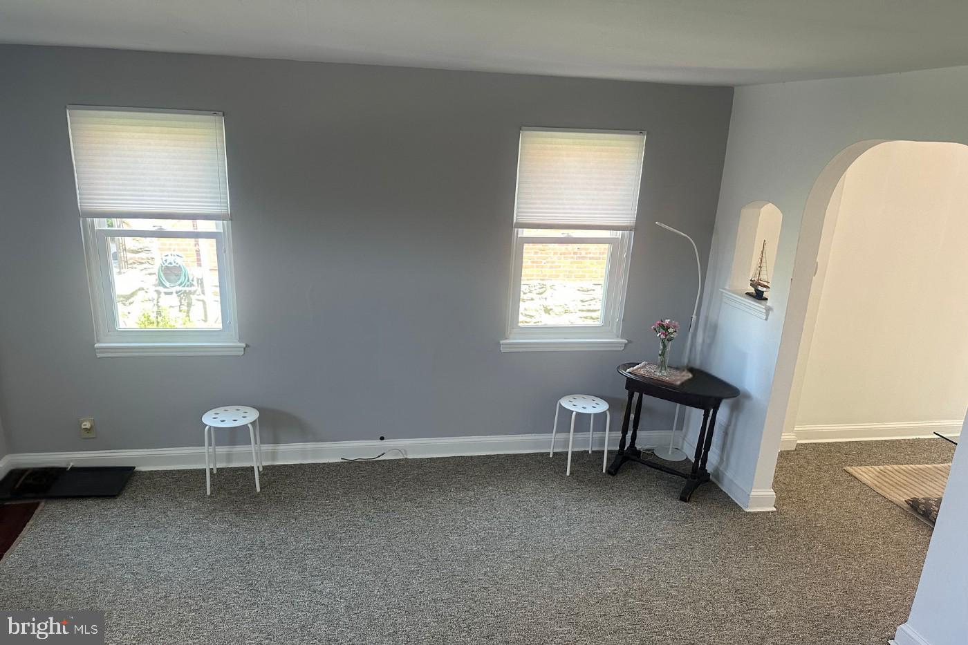 61 Greenhill Road Media, PA 19063 - Photo 7 of 37 a room with a window and a chair