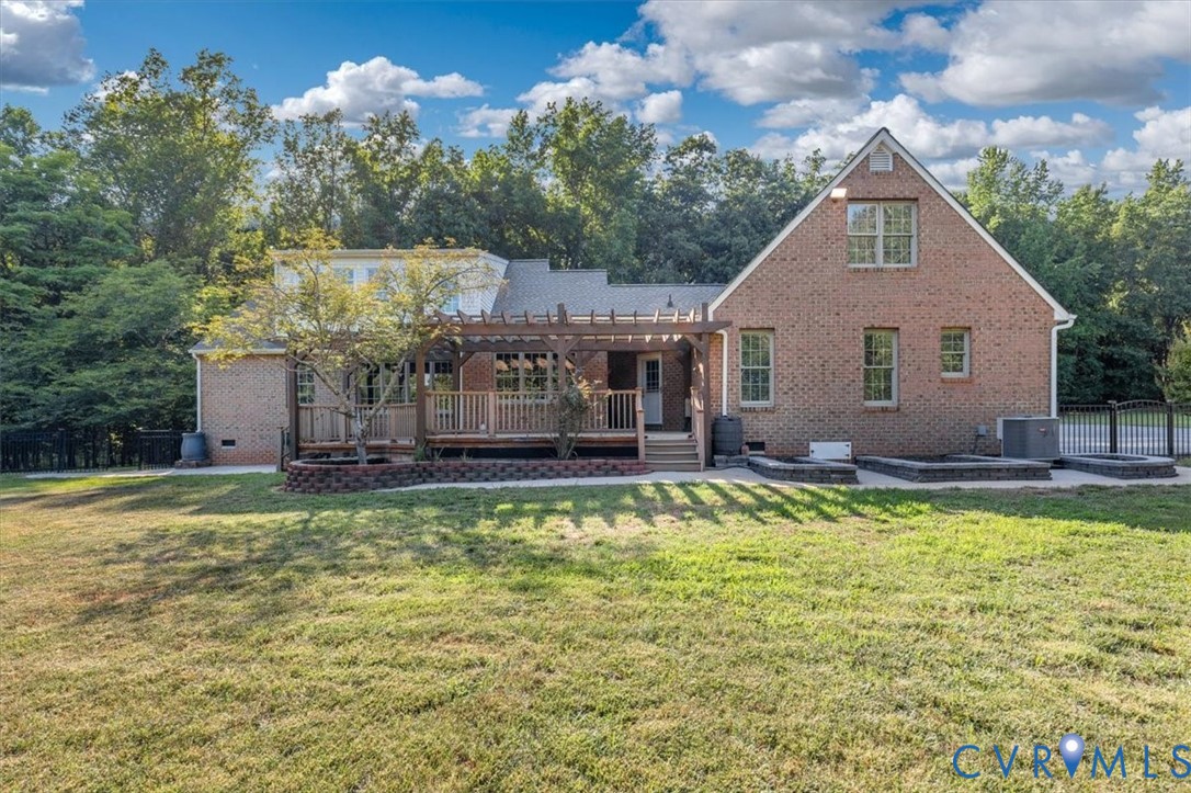 1437 Palmore Road Powhatan, VA 23139 - Photo 50 of 60 Rear exterior featuring a brick facade, multi-leve