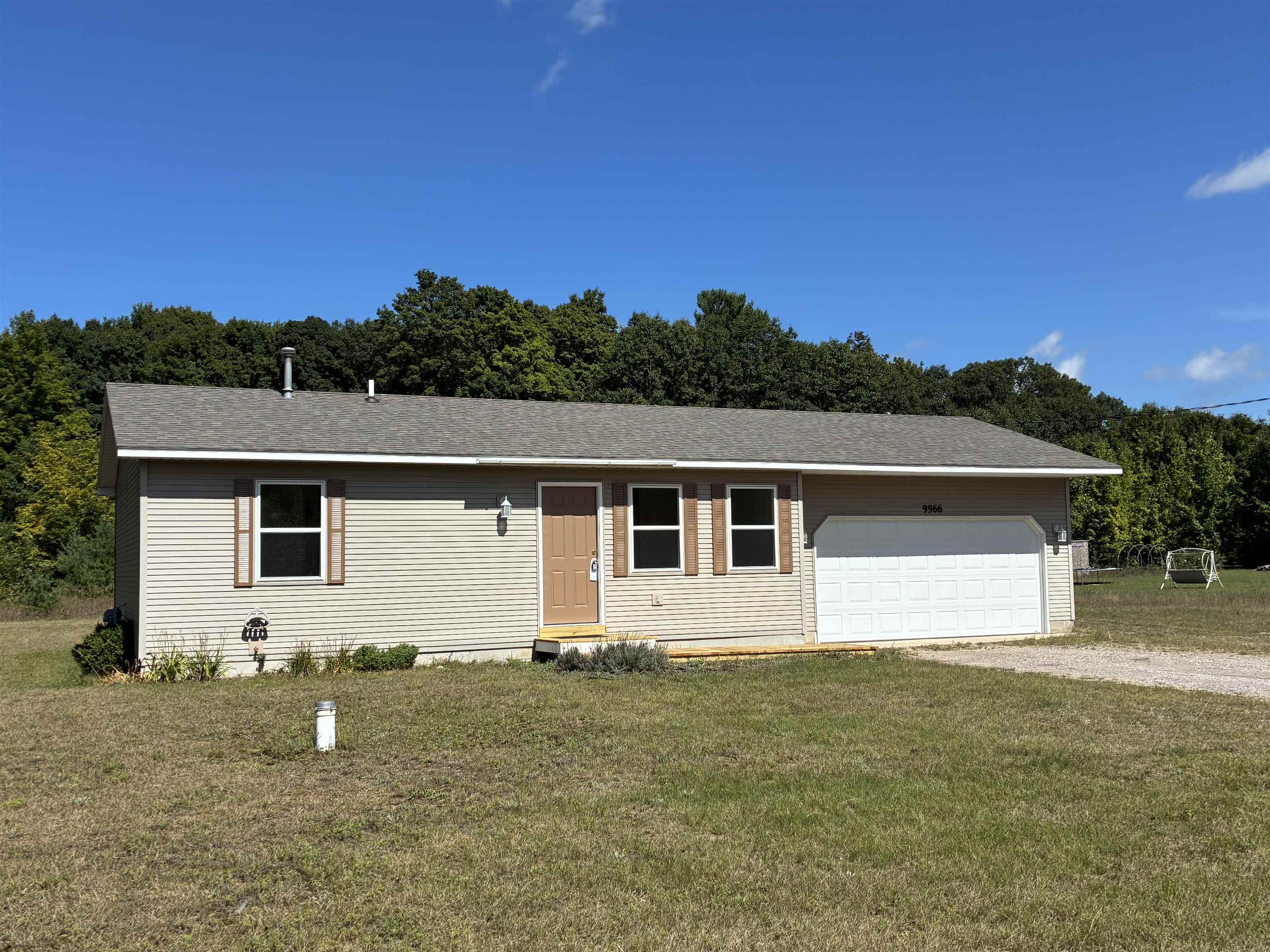 9966 Cedar Run Road Traverse City, MI 49684 - Photo 1 of 33 1950427-c36cf72c-b134-4c9f-b286-aa0a192590bf.JPG