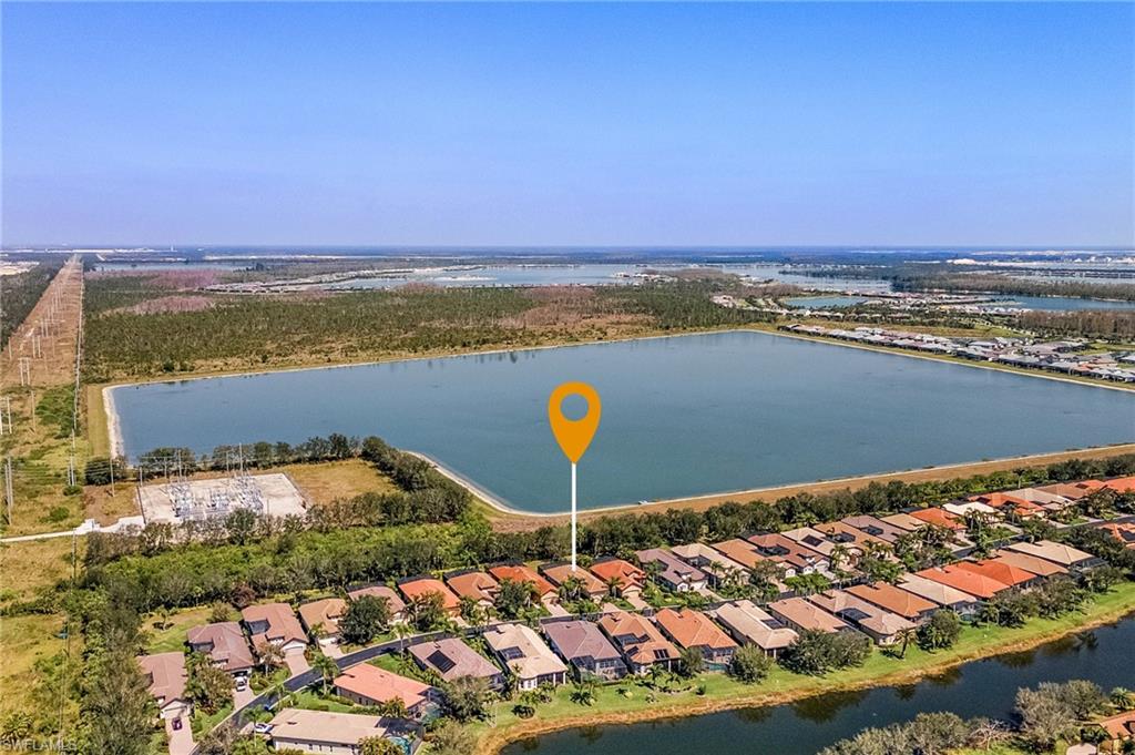 12595 Grandezza Circle Estero, FL 33928 - Photo 21 of 33 a view of an ocean and city