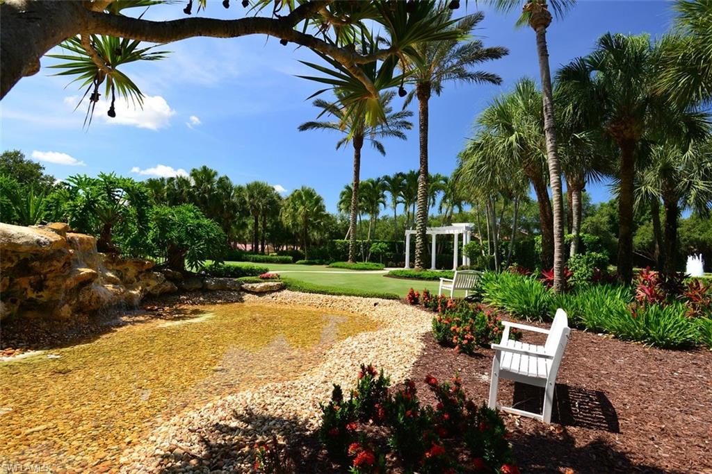 12595 Grandezza Circle Estero, FL 33928 - Photo 31 of 33 a view of a backyard with sitting area