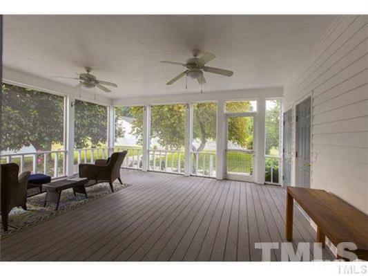 9123 South Lowell Road Bahama, NC 27503 - Photo 20 of 25 a living room with furniture and large windows