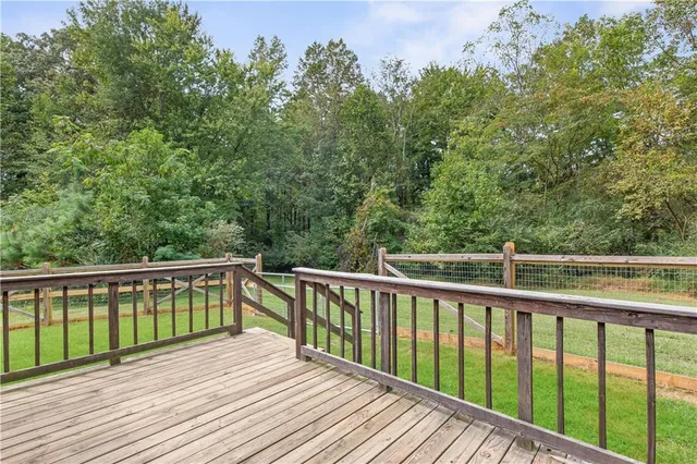 a view of a small space with wooden floor