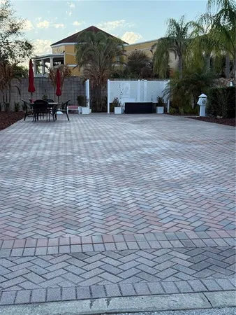 a view of a car park in front of house