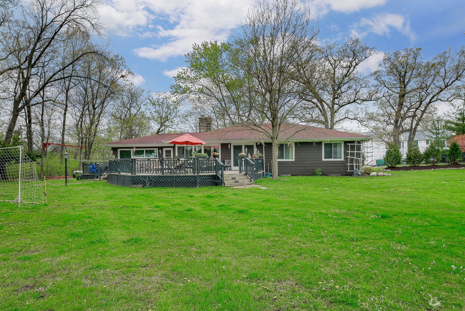 3309 York Road Oak Brook, IL 60523 - Photo 15 of 18 a view of a house with a yard