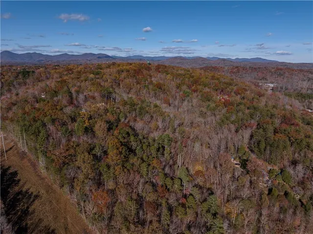 a view of an outdoor space and a mountain view in back