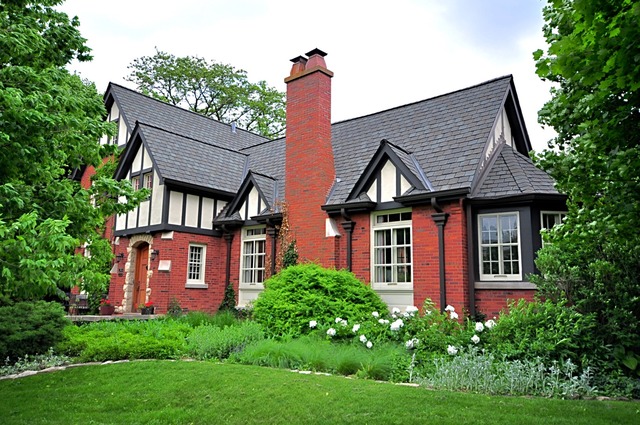 85 Akenside Road Riverside, IL 60546 - Photo 1 of 24 a front view of a house with garden