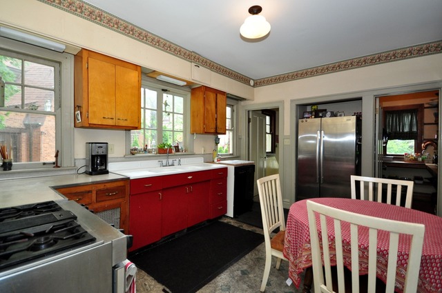 85 Akenside Road Riverside, IL 60546 - Photo 12 of 24 a kitchen with stainless steel appliances granite countertop a stove a refrigerator and a stove