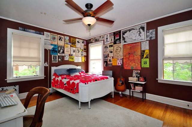 85 Akenside Road Riverside, IL 60546 - Photo 19 of 24 a bedroom with a bed and a chandelier