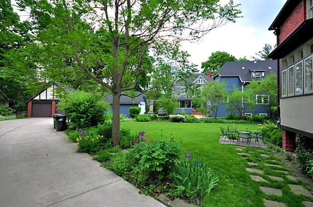 85 Akenside Road Riverside, IL 60546 - Photo 20 of 24 a view of a garden with large trees